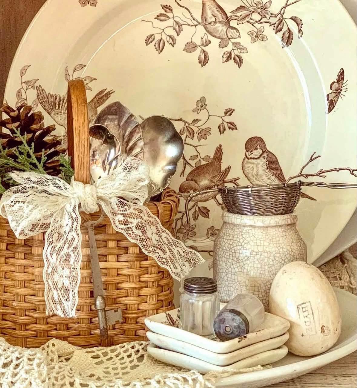 Cream transferware, wicker basket, lace, and vintage kitchen pieces