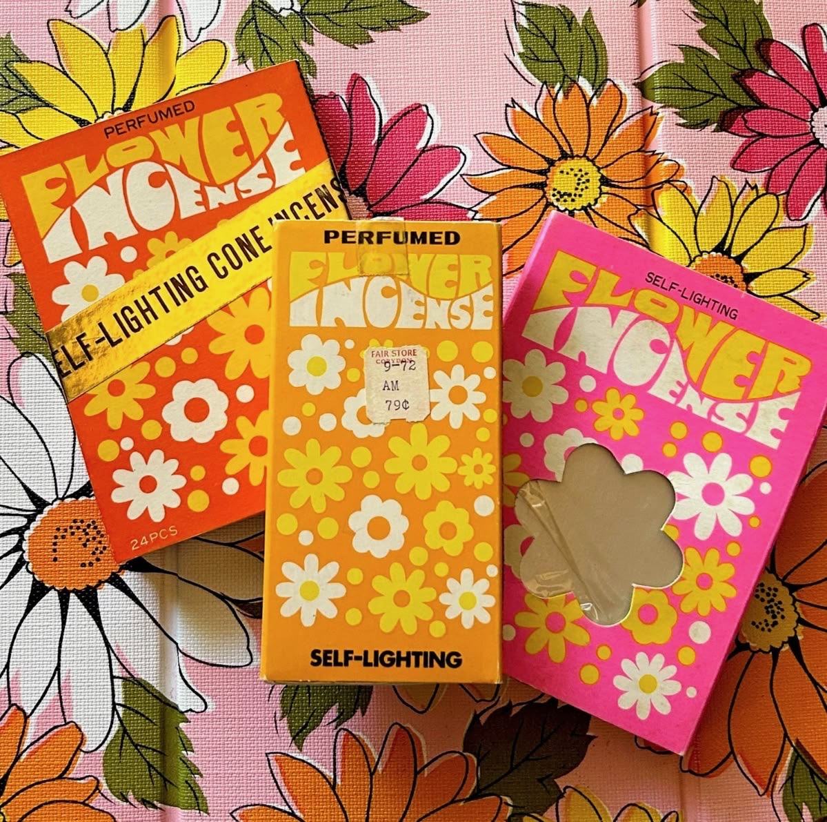 Vintage Flower Incense packaging on floral fabric