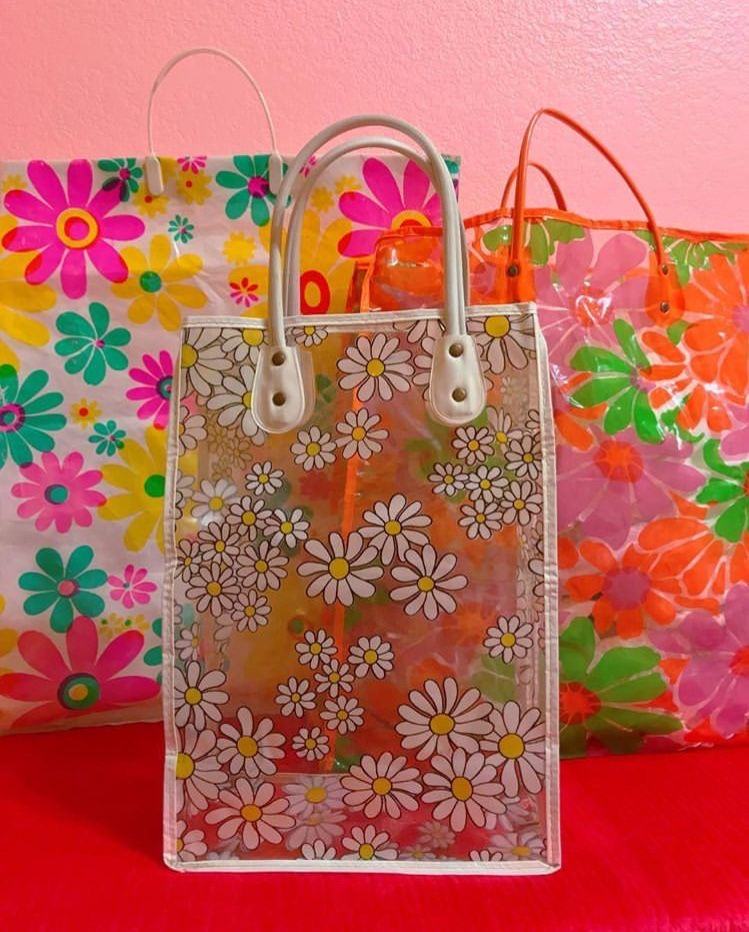Three colorful transparent floral tote bags