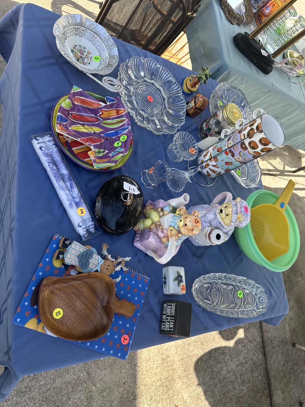 An overhead view of colorful vintage pieces arranged for the pop-up sale