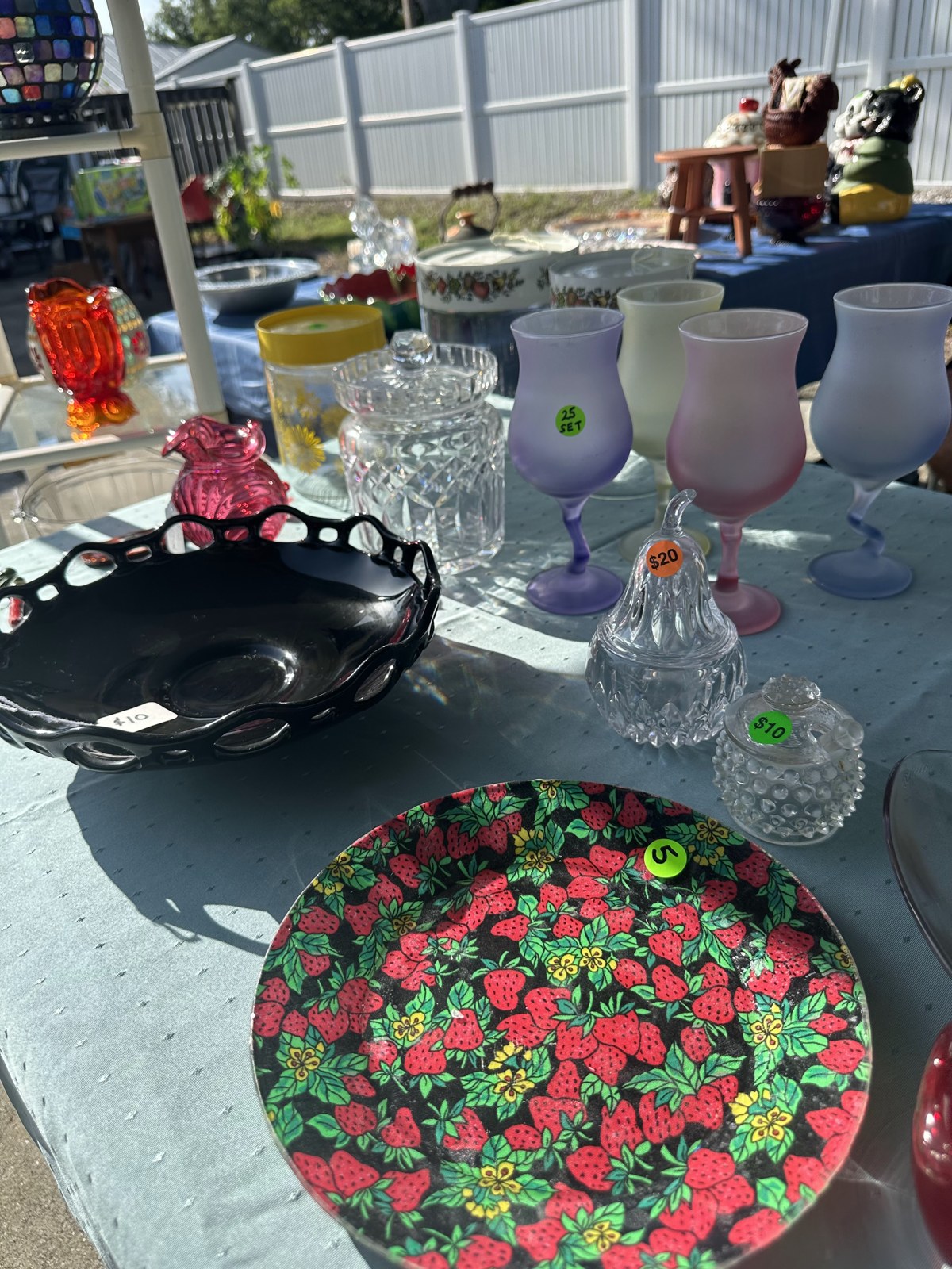 Pastel glasses, decorative plates and glassware at the July pop-up sale