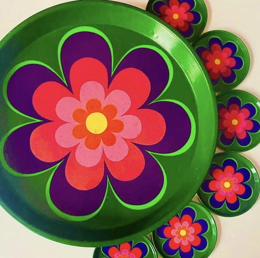 Green tray and coasters with purple and pink flowers