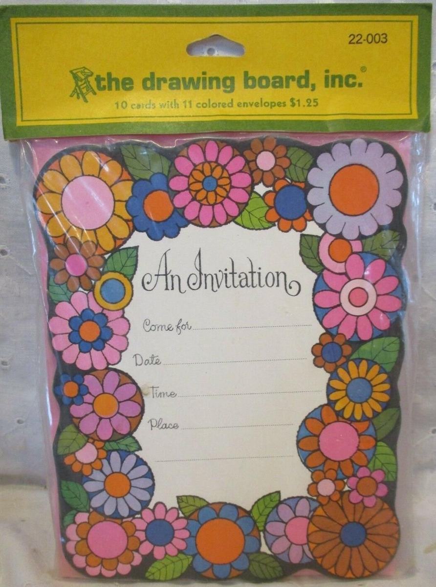 Packaged vintage invitations with a colorful floral border