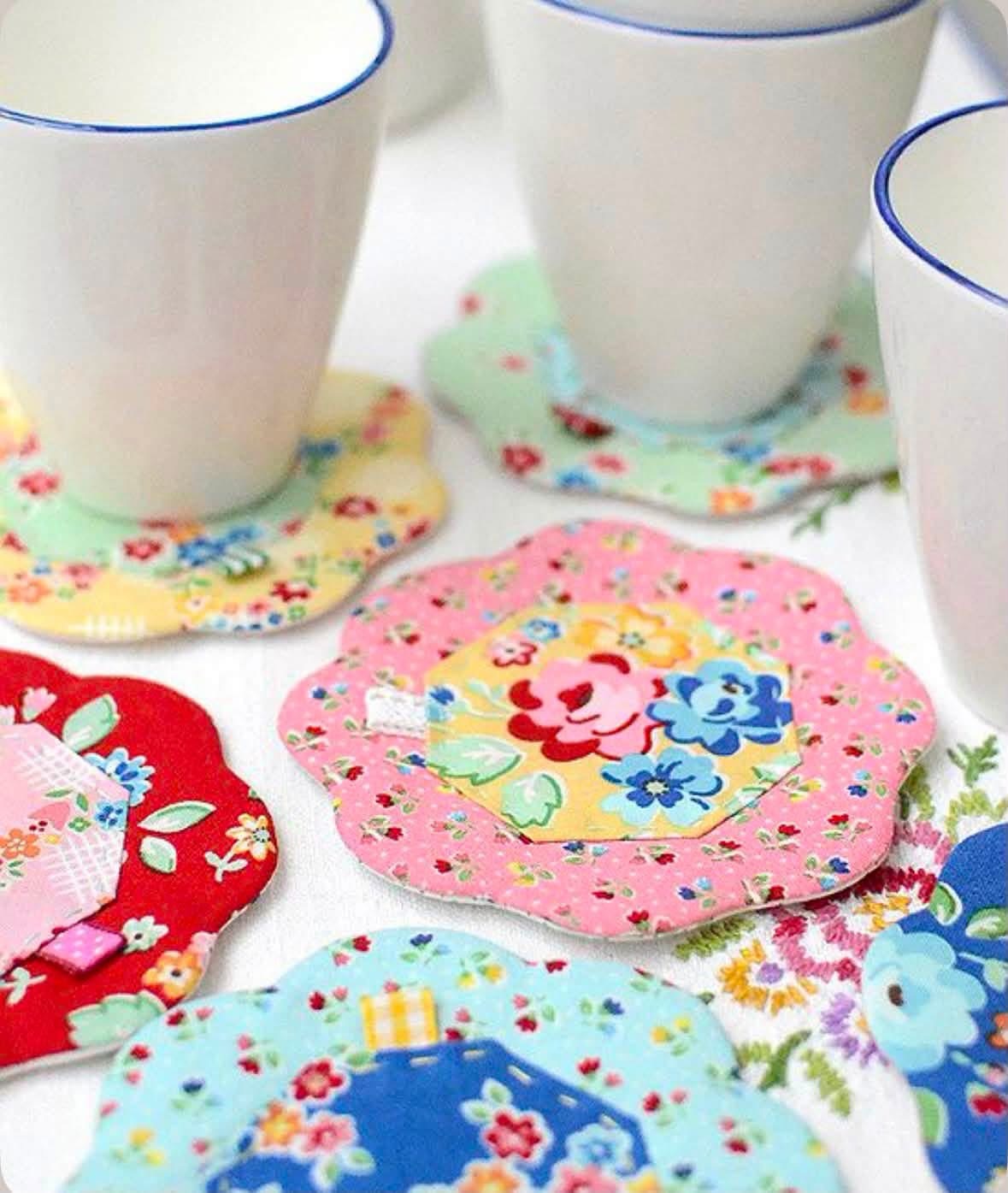 Floral patchwork coasters beneath white mugs