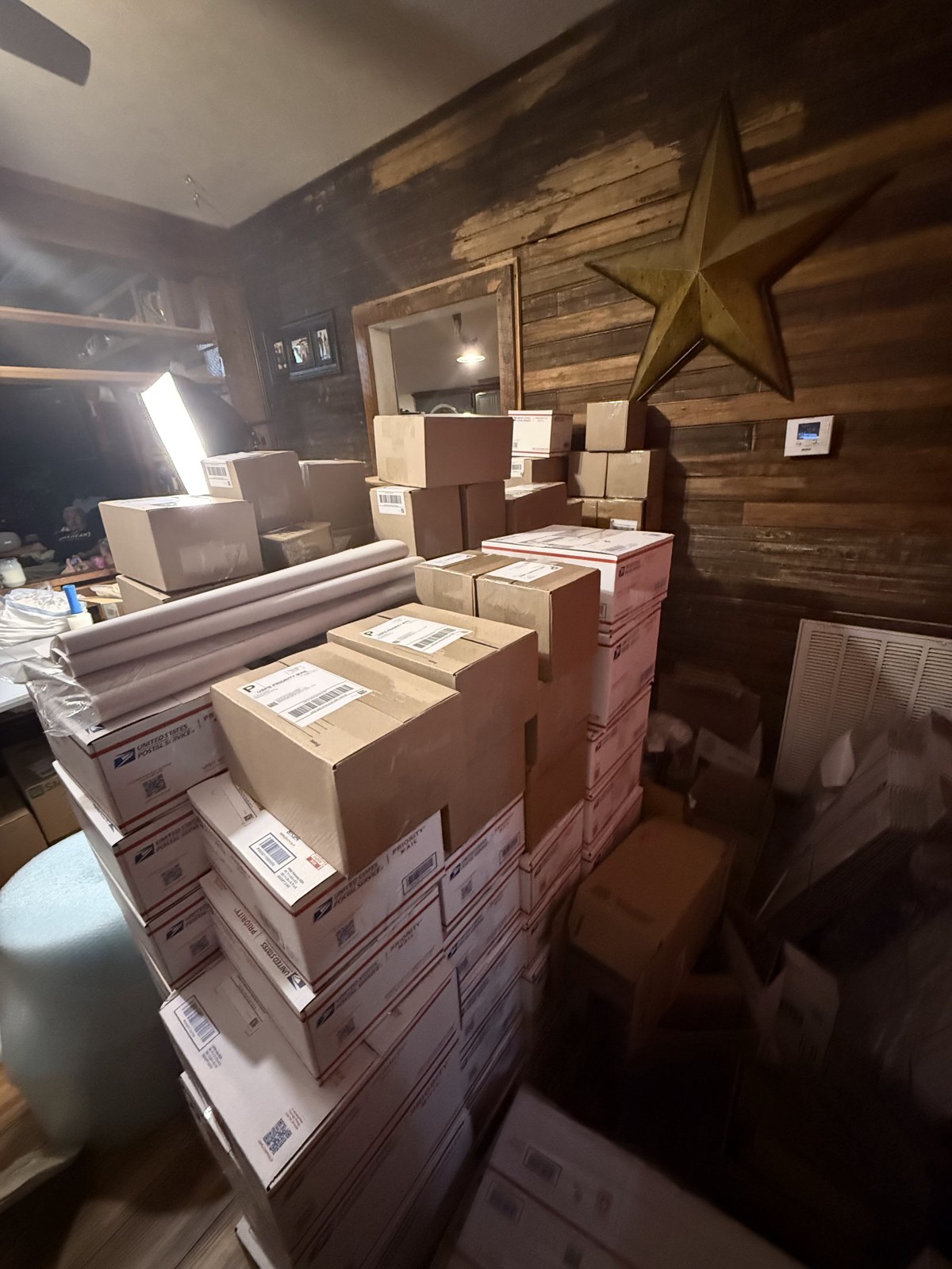 Estate-sale parcels and packing supplies ready for shipping