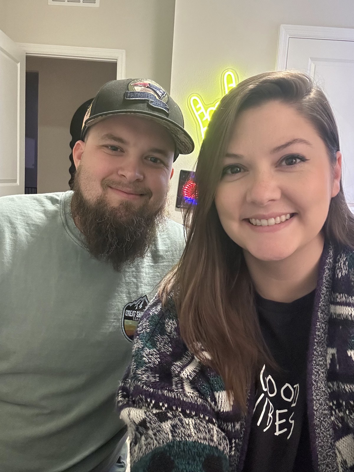 A couple together in the guest-room selling space