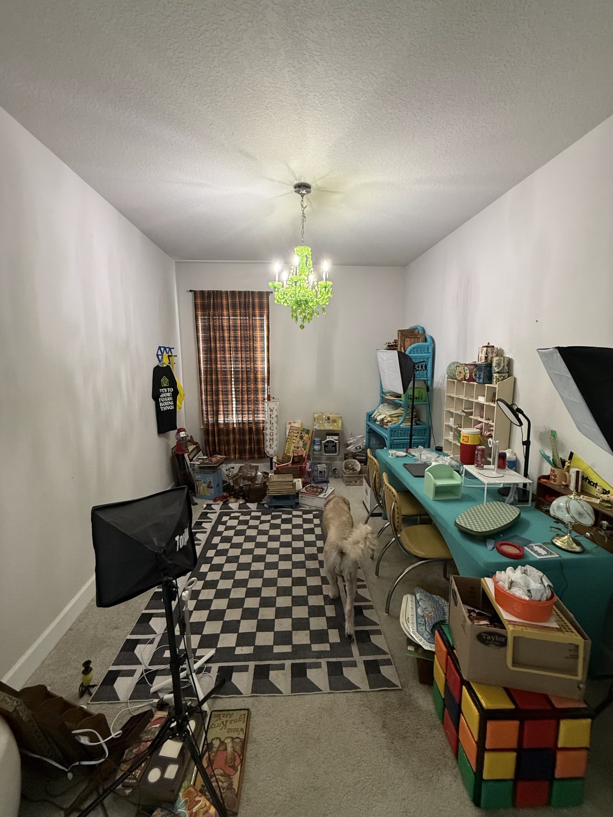 The Whatnot room being rearranged with vintage pieces on tables