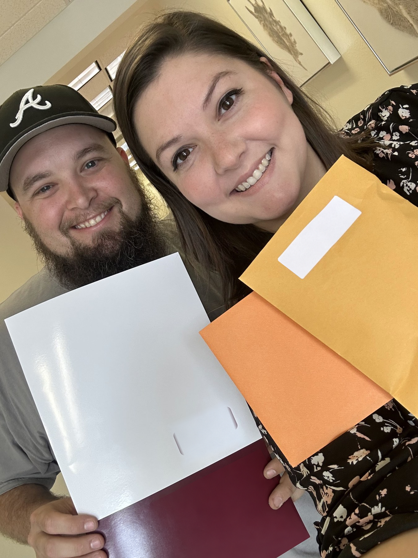 Ashley and Jacob celebrating the closing on their first home in December 2023