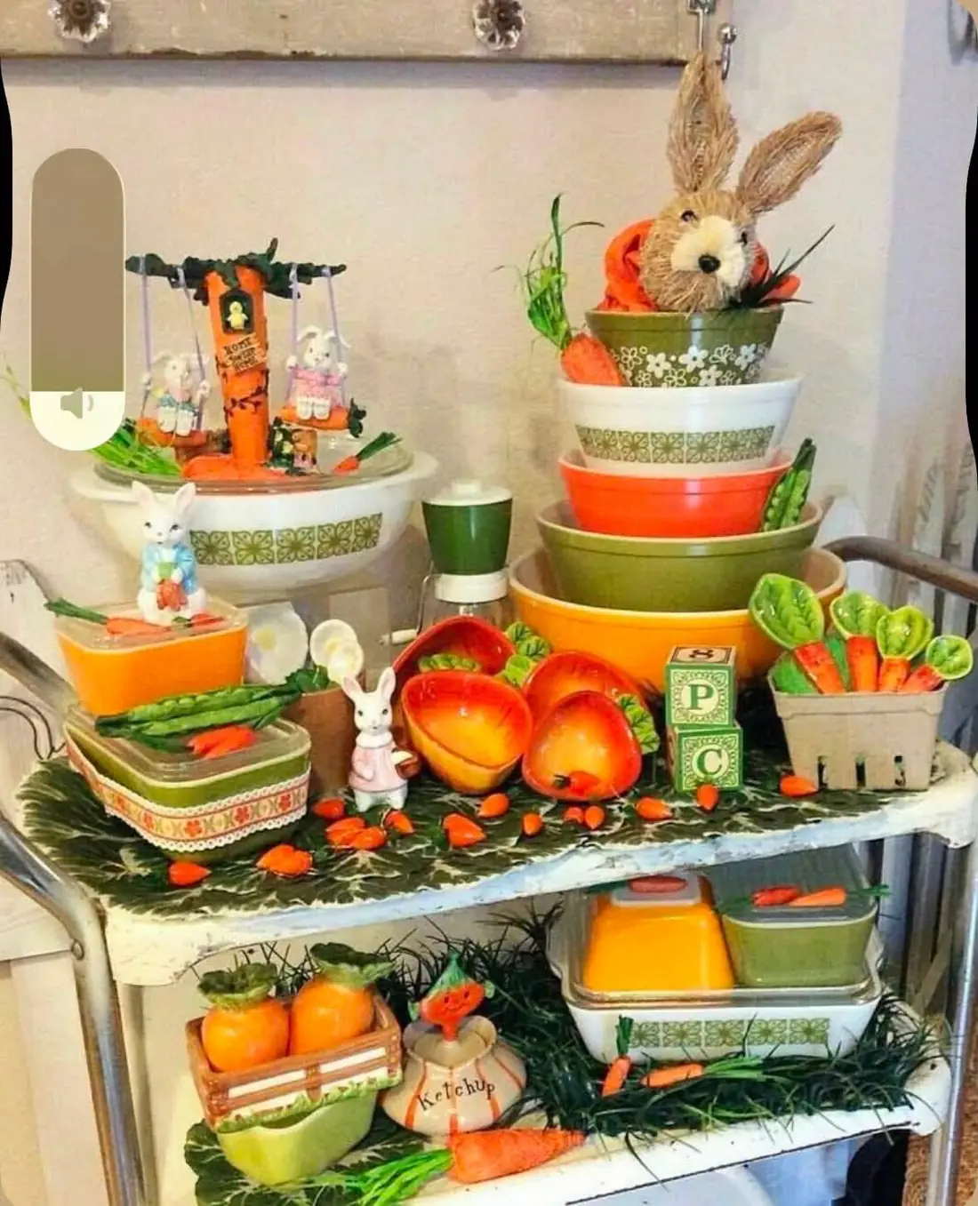 Easter display with orange and green bowls and carrot decorations
