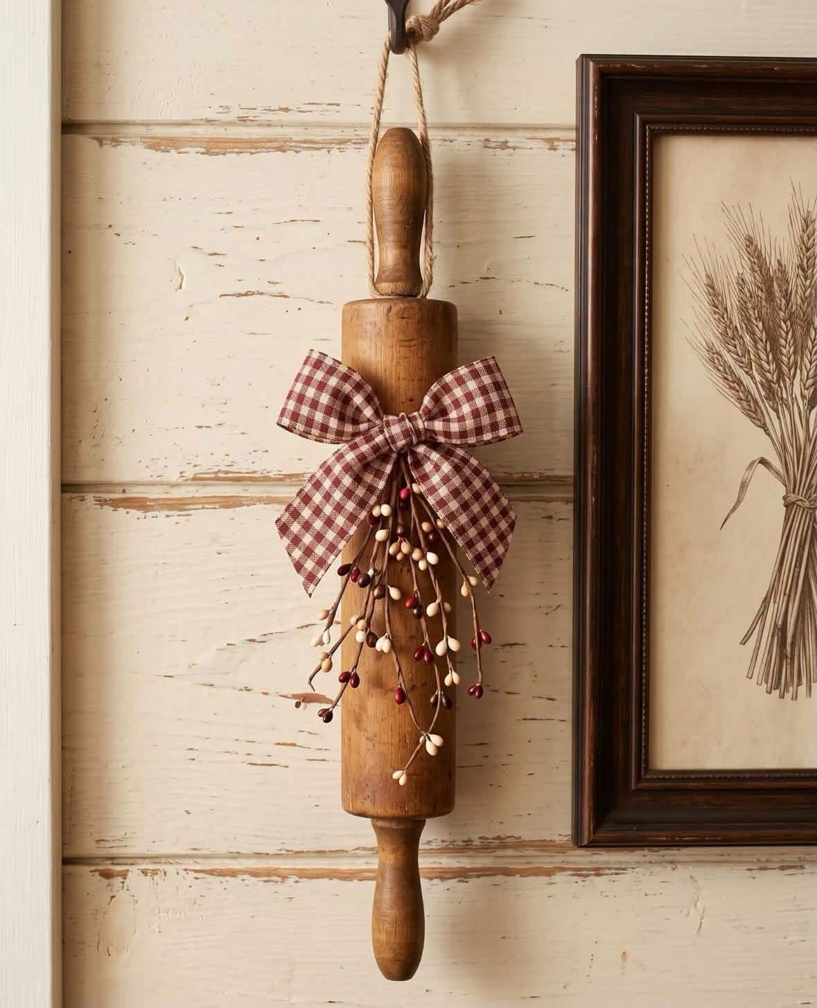 Wooden rolling pin decorated with a gingham bow and berries