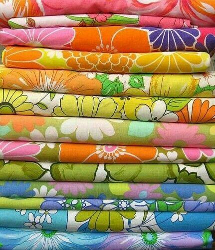 Folded vintage floral fabrics in bright colors