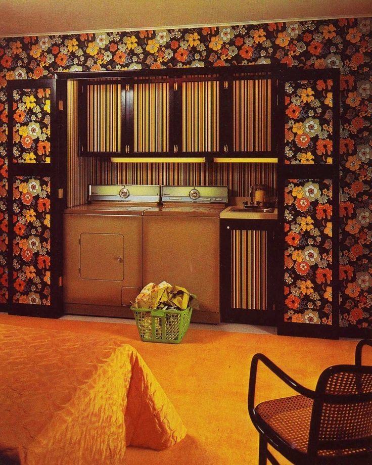 Vintage laundry alcove surrounded by dark floral wallpaper