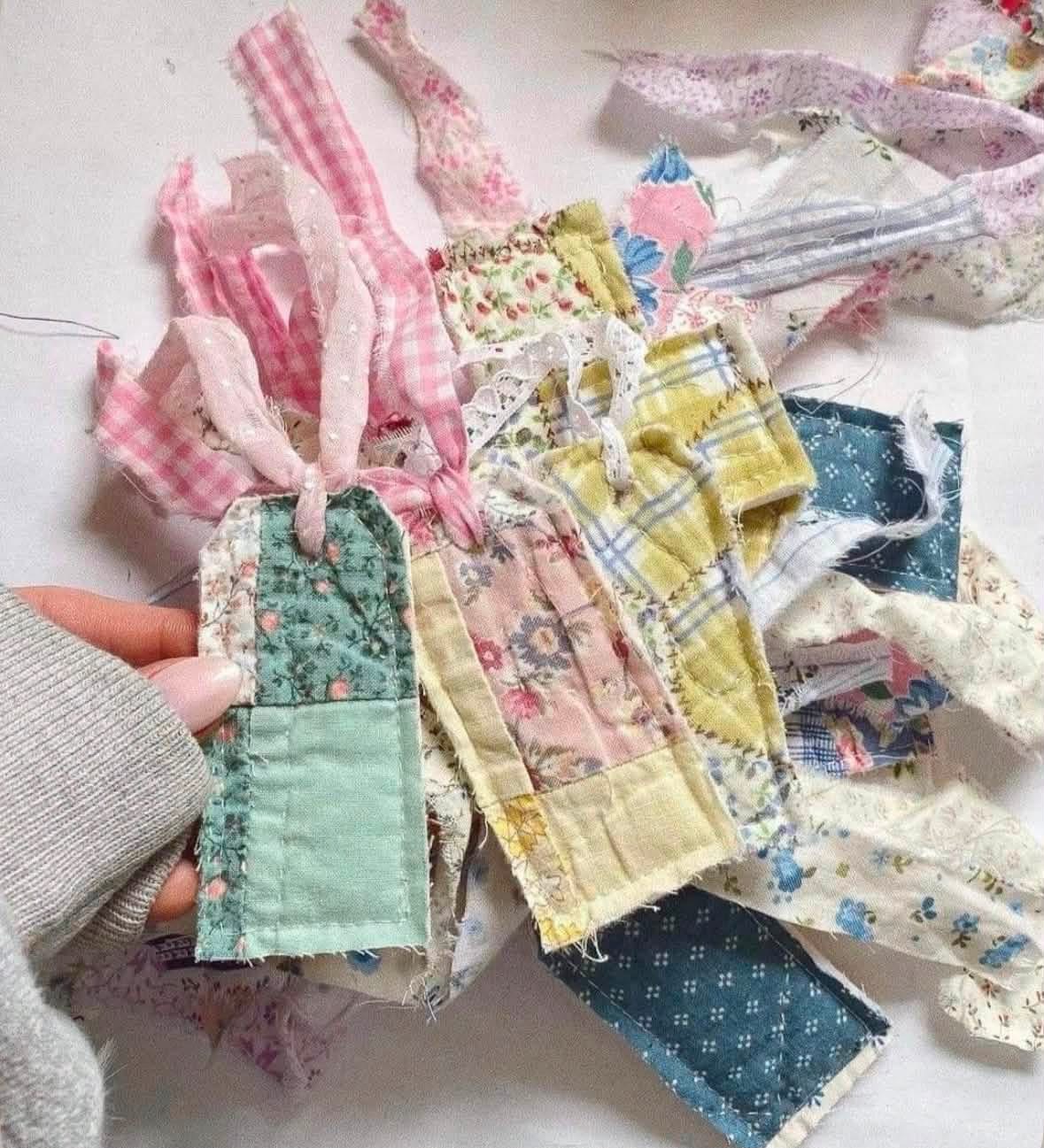 Fabric tags made from pastel quilt scraps and ribbons