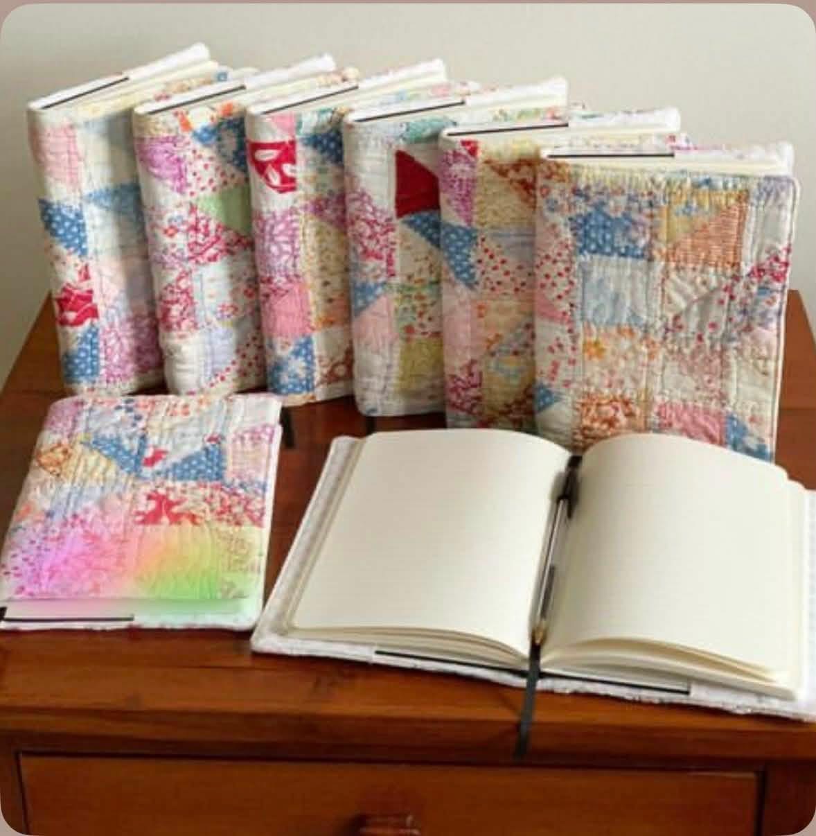 Notebooks covered in pastel patchwork quilt fabric