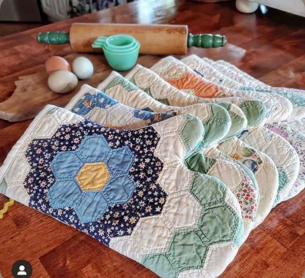 Quilted oven mitts with colorful floral patchwork