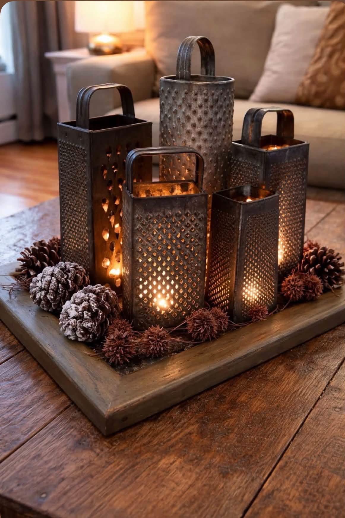 Vintage metal graters arranged as glowing lanterns